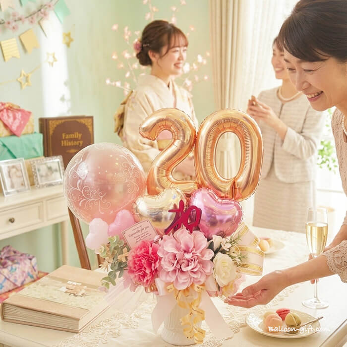 数字20のローズゴールドとゴールドの卓上バルーンアレンジパーティ会場での撮影