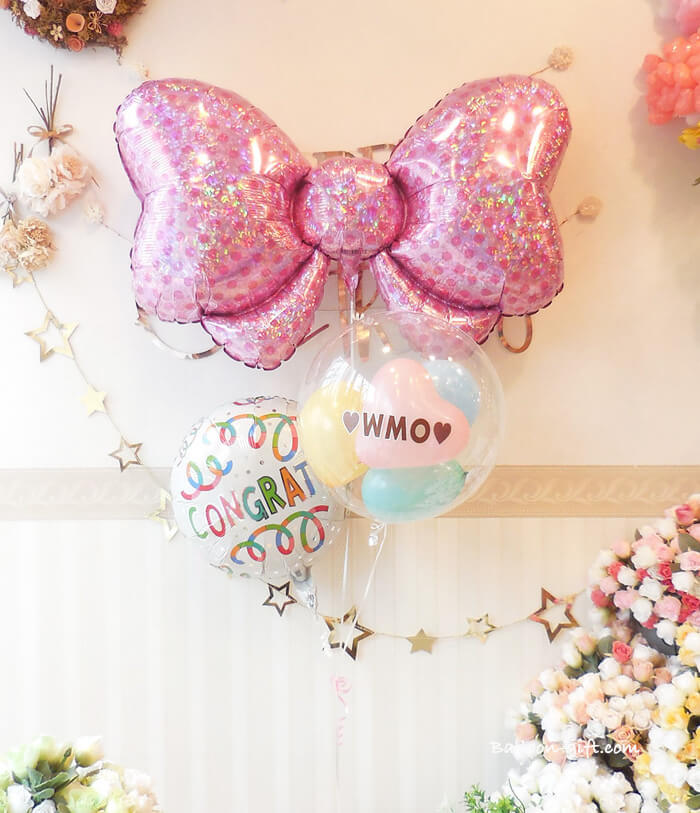 開けた瞬間ふわっと浮かぶピンクリボンバルーンギフト