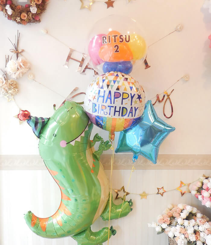 箱を開けた瞬間に浮かぶ恐竜バルーンのイメージ